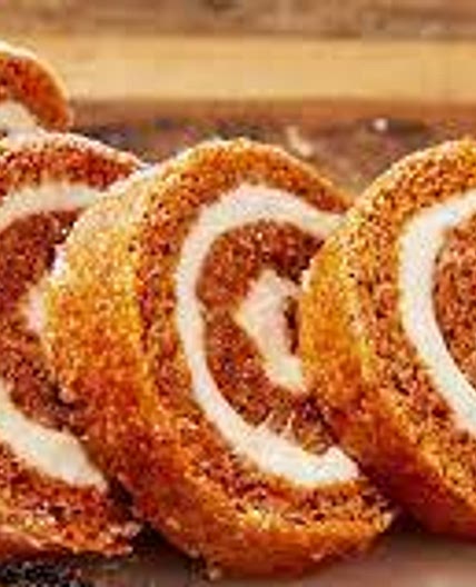Pumpkin Roll with Vanilla Cream and Caramel Glaze