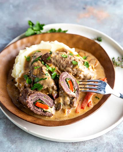 Cheesy Veal rolls with Mushroom Sauce