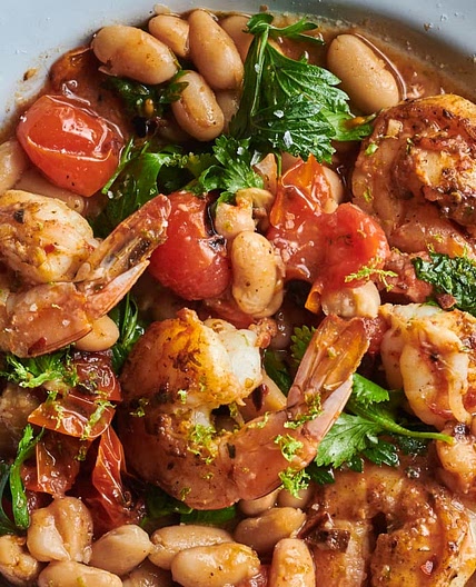 Garlicky Sautéed Shrimp with Creamy White Beans and Blistered Tomatoes