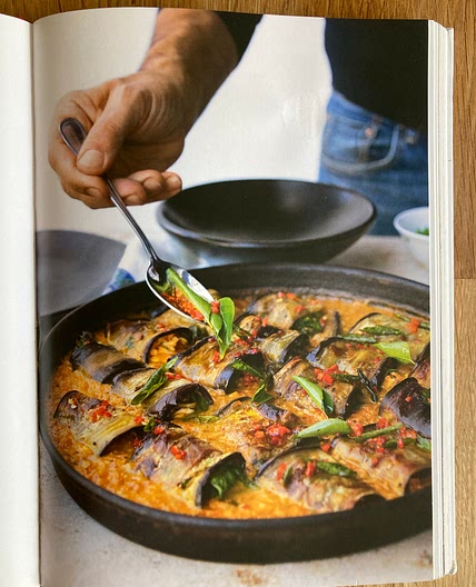 Stuffed aubergine in curry and coconut dal