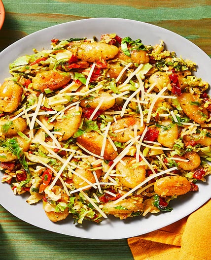 Pan-Fried Garlic Herb Gnocchi with Brussels Sprouts & Sun-Dried Tomatoes