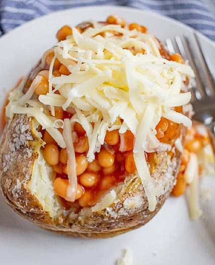 baked potato, cheese & beans