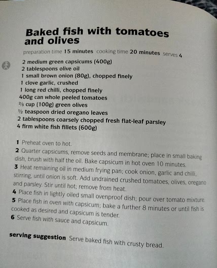 Baked fish with tomato and olives