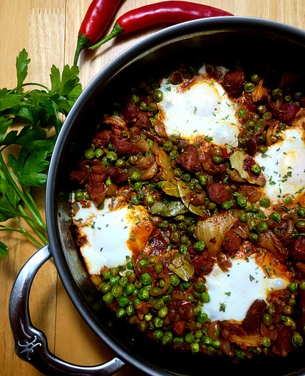 Ervilhas com Ovos Escalfados (Portuguese Braised Peas with Poached Eggs & Chourico).