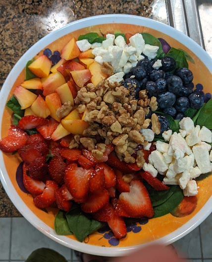 Summer spinach salad with fresh fruit & walnuts