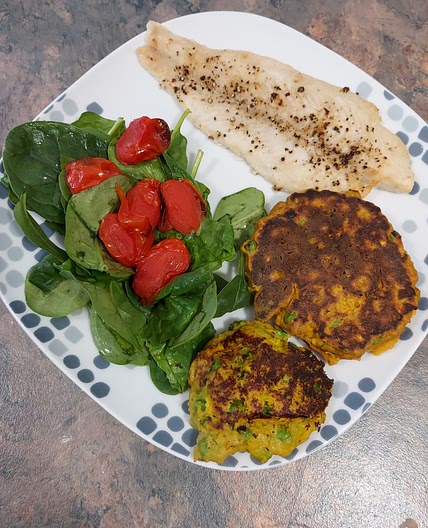 SEA BASS WITH SPICED PEA AND POTATO CAKES