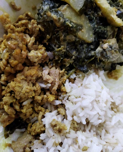 Tumeric pork with hummus cuccs/spinach