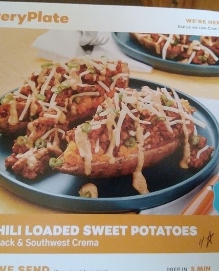 Pork Chili loaded sweet potatoes  with pepperjack & southwest crema