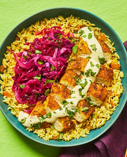 Curried Chicken with Golden Raisin Rice, Pickled Cabbage & Lemon Curry Sauce