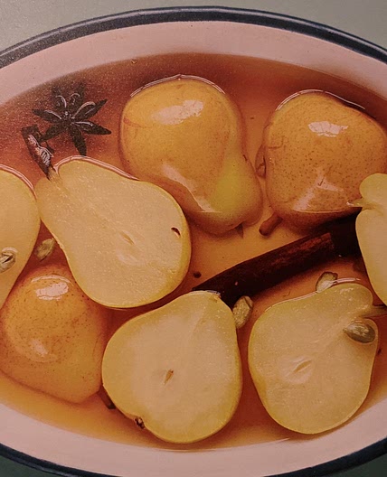 Spiced pears with almonds chocolate creme fraiche