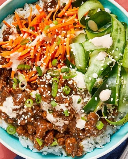 Pork Bulgogi Bowls with Carrots, Pickled Cucumber, & Sriracha Cr