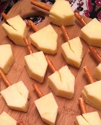 Cheese and pretzel dreidels