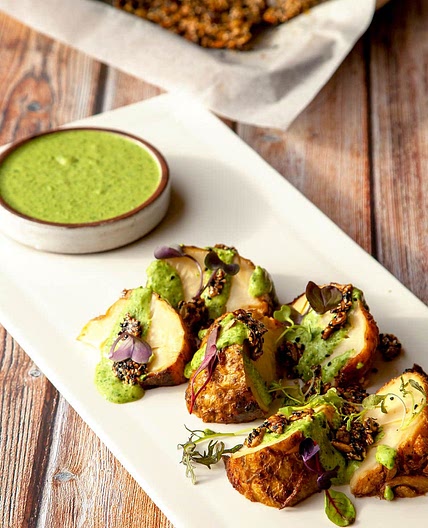 Slow roasted celeriac with green tahini sauce