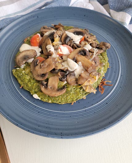 Spinach wrap with mushrooms and veggies