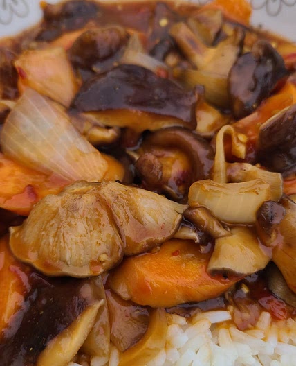 Shiitake mushrooms and carrots in a brown sauce