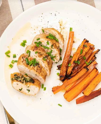 Roasted chicken breast with maple carrots