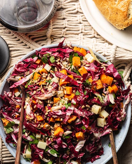 Raw and Roasted Radicchio Salad with Sweet Potato, Manchego, and Crunchy Seeds