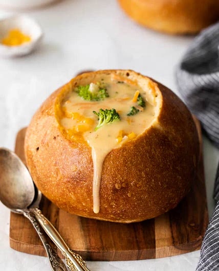 Cheddar broccoli soup in bread bowl