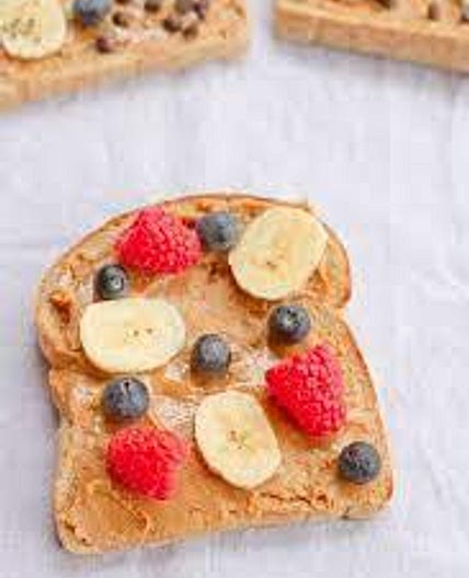 Peanut butter toast with berry compote