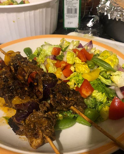 Jerk chicken skewers with mango salad