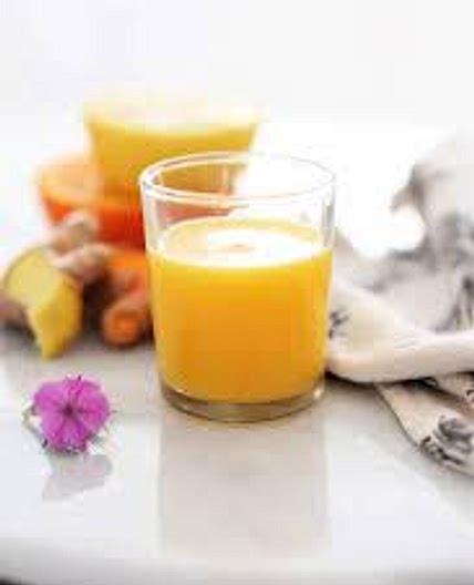 Lemon ginger tumeric shot