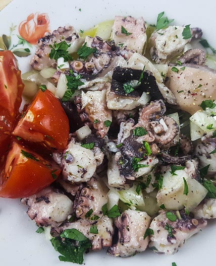 Octopus on salad (Croatian recipe)