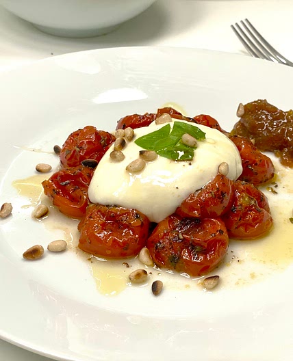 Burrata with rosted tomatoes and honey
