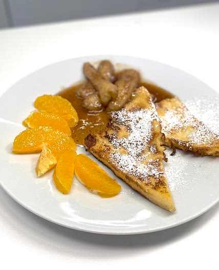 French toast with bananas in caramel