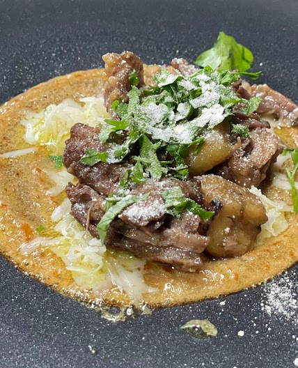 Braised short ribs tacos in dates sauce 