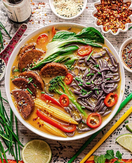 Thai yellow curry soup with tempeh and black soba noodles