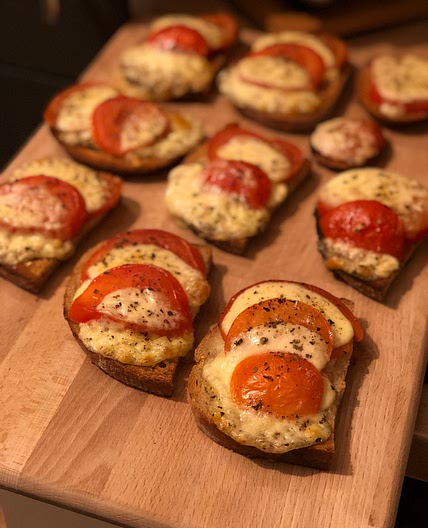 Fried bread with mozzarella and tomato. 