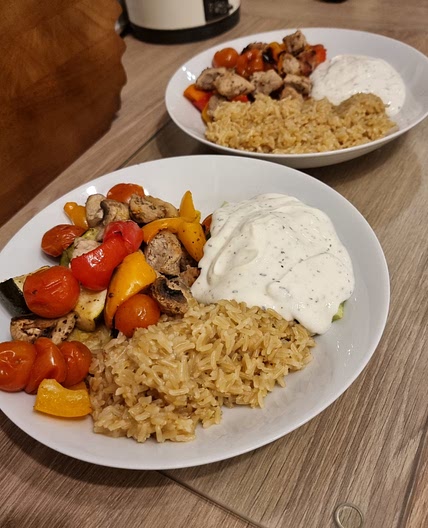 Pork souvlaki traybake with tzatziki and rice