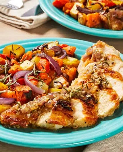 Creamy peppercorn chicken with roasted potatoes and Carrots