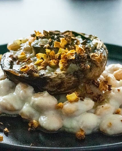 Jerusalem artichokes and butter beans with baked portobello mushroom and whiskey sauce