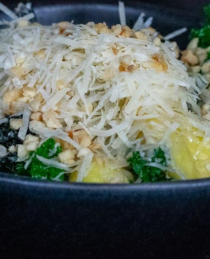 Gnocchi with kale, parmesan, lemon and toasted hazelnuts