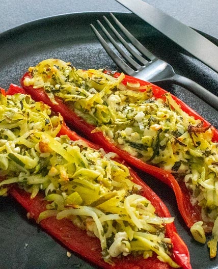 Stuffed romano peppers with courgette, mint and feta
