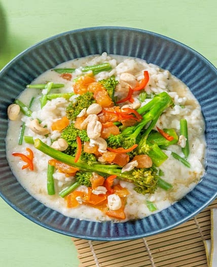 Cremiges Risotto mit Brokkolini & grünen Bohnen Bei diesem Gericht wird 50% weniger CO2e durch Zutaten & Transport verursacht als bei einem durchschnittlichen HelloFresh Rezept