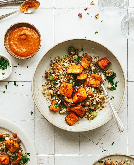 Roast aubergine with mixed grains and red pepper sauce