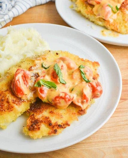 Parmesan Crusted Tilapia with Tomato-Basil Cream Sauce