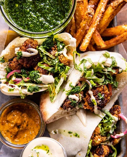 Roasted Cauliflower Pitas with Zhug and Garlic Tahini