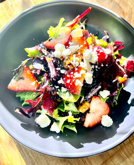 Organic Greens With Berries and Feta Cheese