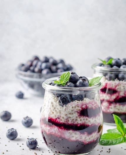 Blueberry Chia Seed Pudding  with White Sesame Milk, Mango & Almonds