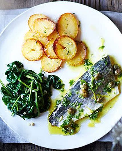 Baked sea bass with lemon caper dressing