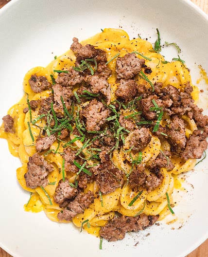 Orecchiette with pumpkin sauce and fennel pork mince