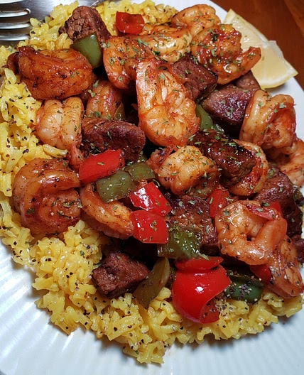 Jerk Steak & Shrimp over Yellow Rice
