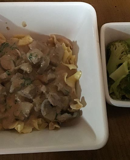 Beef Stroganoff with egg noodles and broccoli