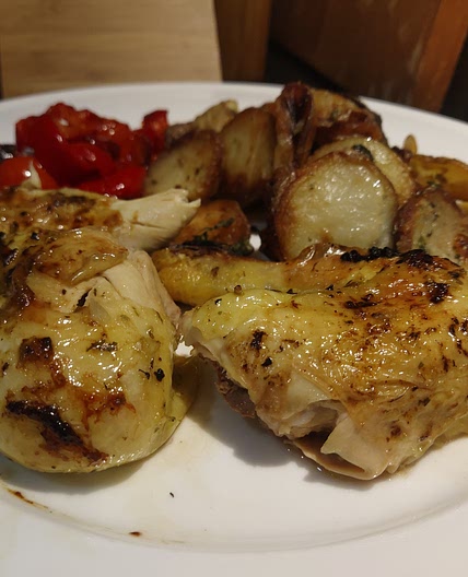 Peruvian Poussin with Sauté Potatoes & Tomato and Red Pepper
