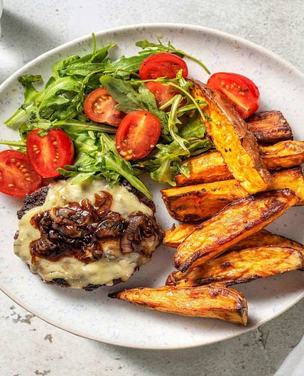 Naked Cheeseburger with Caramelised Onion, Sweet Potato Wedges and Salad
