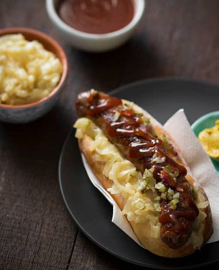 Sausage sizzle with beer braised onions
