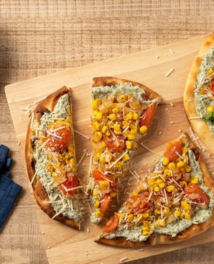Basil Ricotta and Vegetable Flatbread with corn and arugula